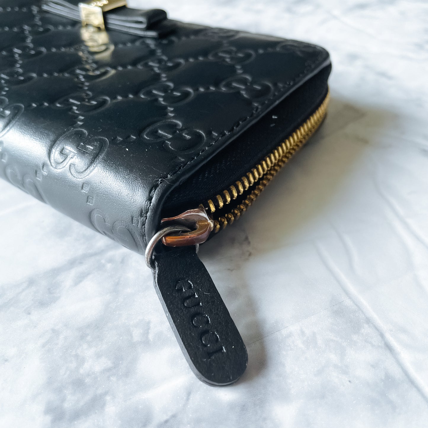 GUCCI Guccissima Bow Zipper wallet