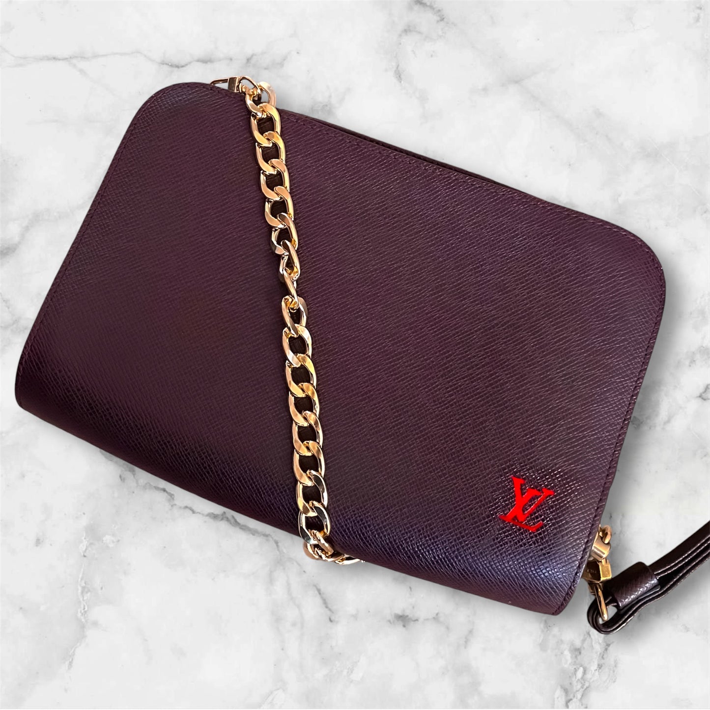 Louis Vuitton Baikal Taiga clutch crossbody