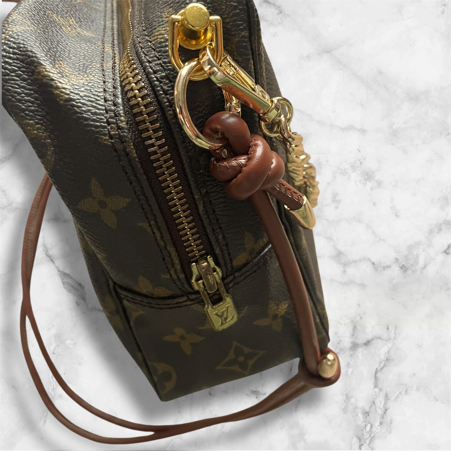 Louis Vuitton Trousseau De Toilette 28 crossbody