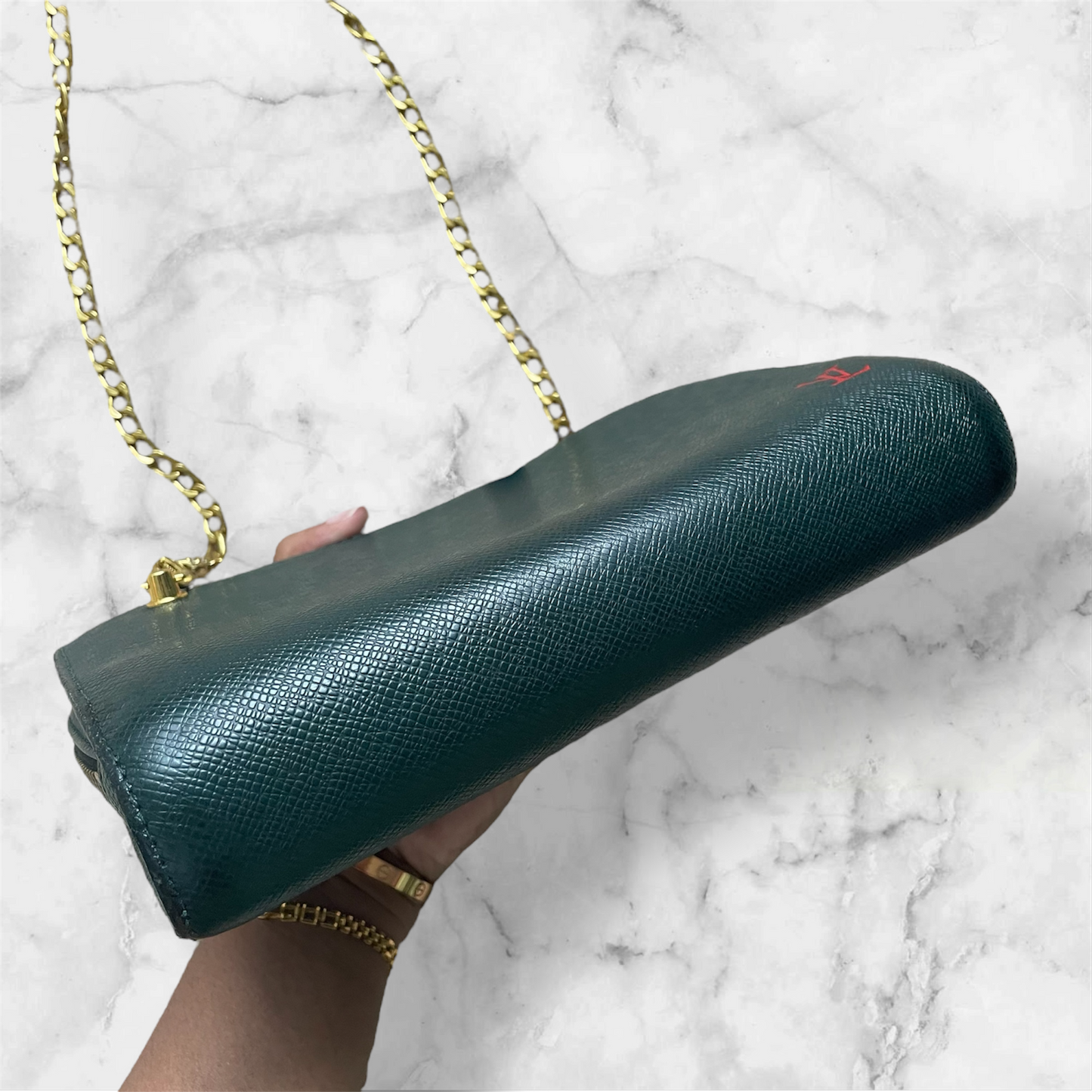 Louis Vuitton Taiga clutch crossbody
