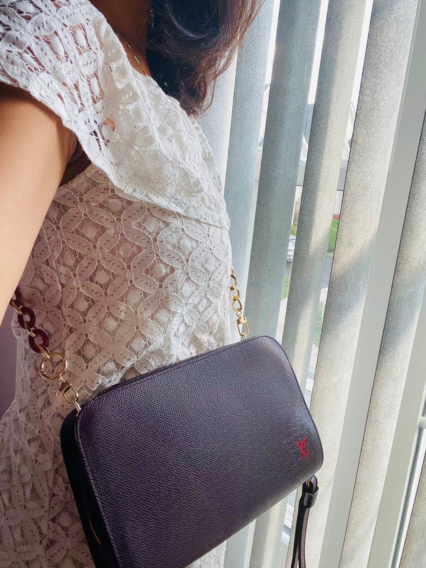 Louis Vuitton Baikal Taiga clutch crossbody