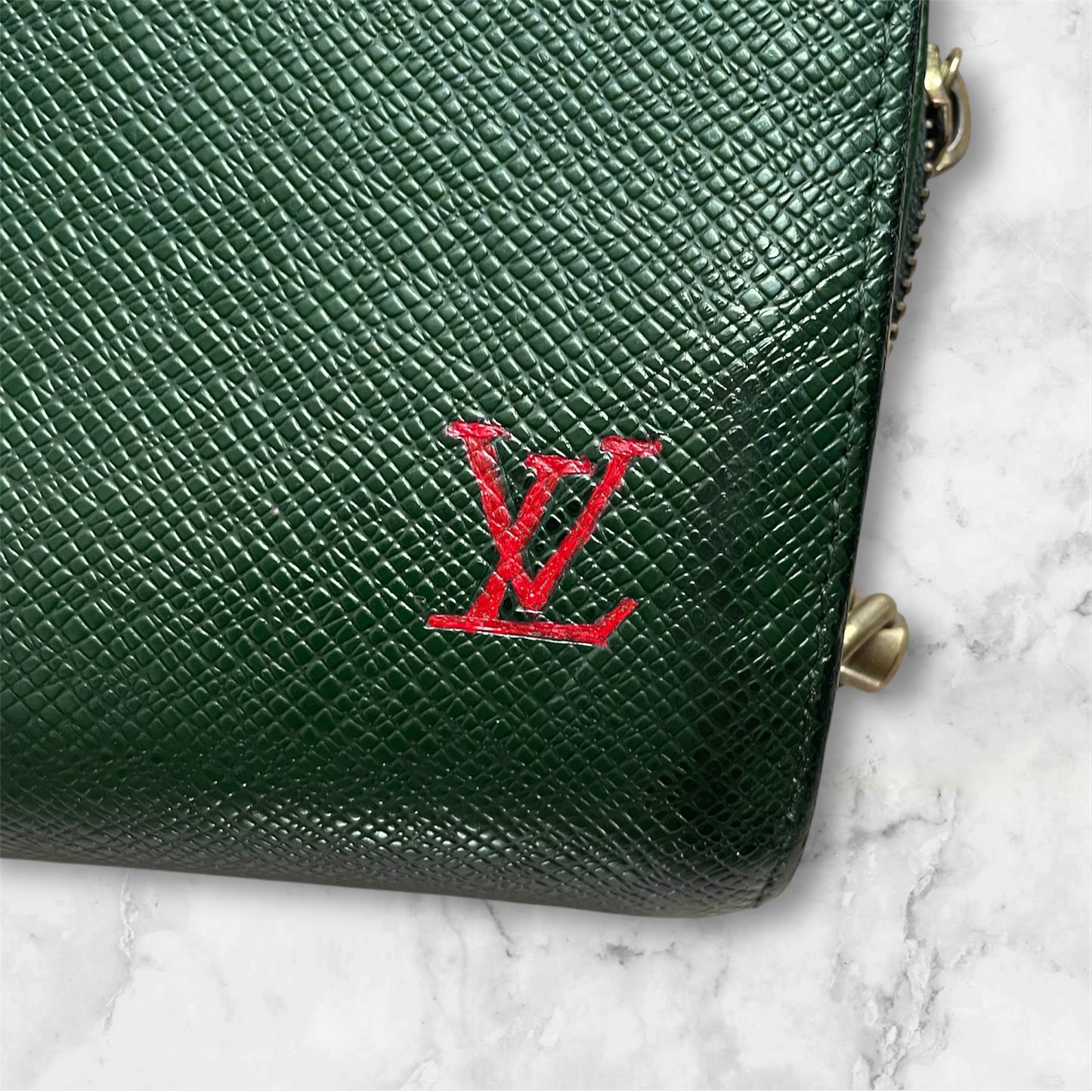 Louis Vuitton Taiga clutch crossbody