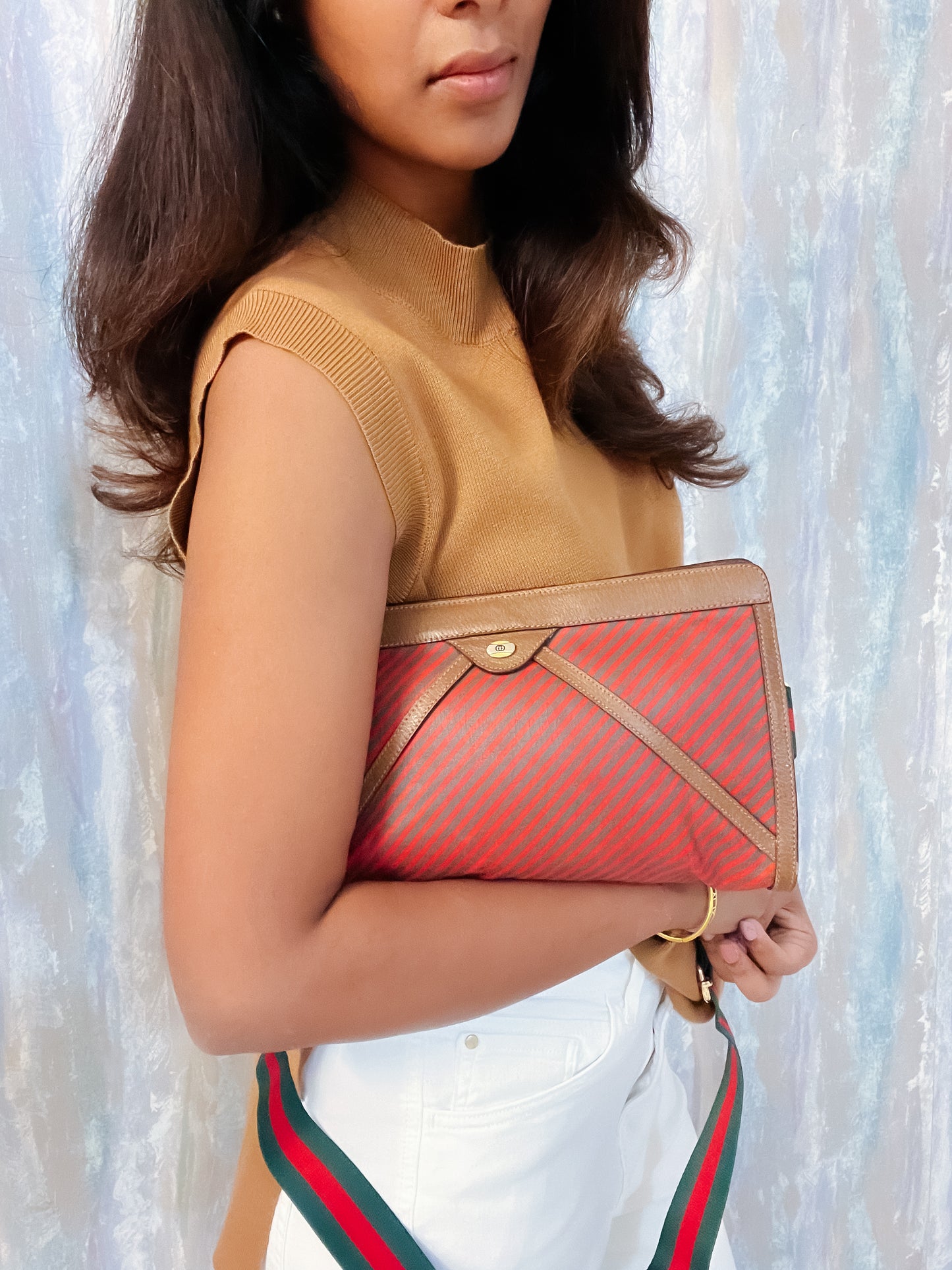 Authentic vintage Gucci clutch with strap