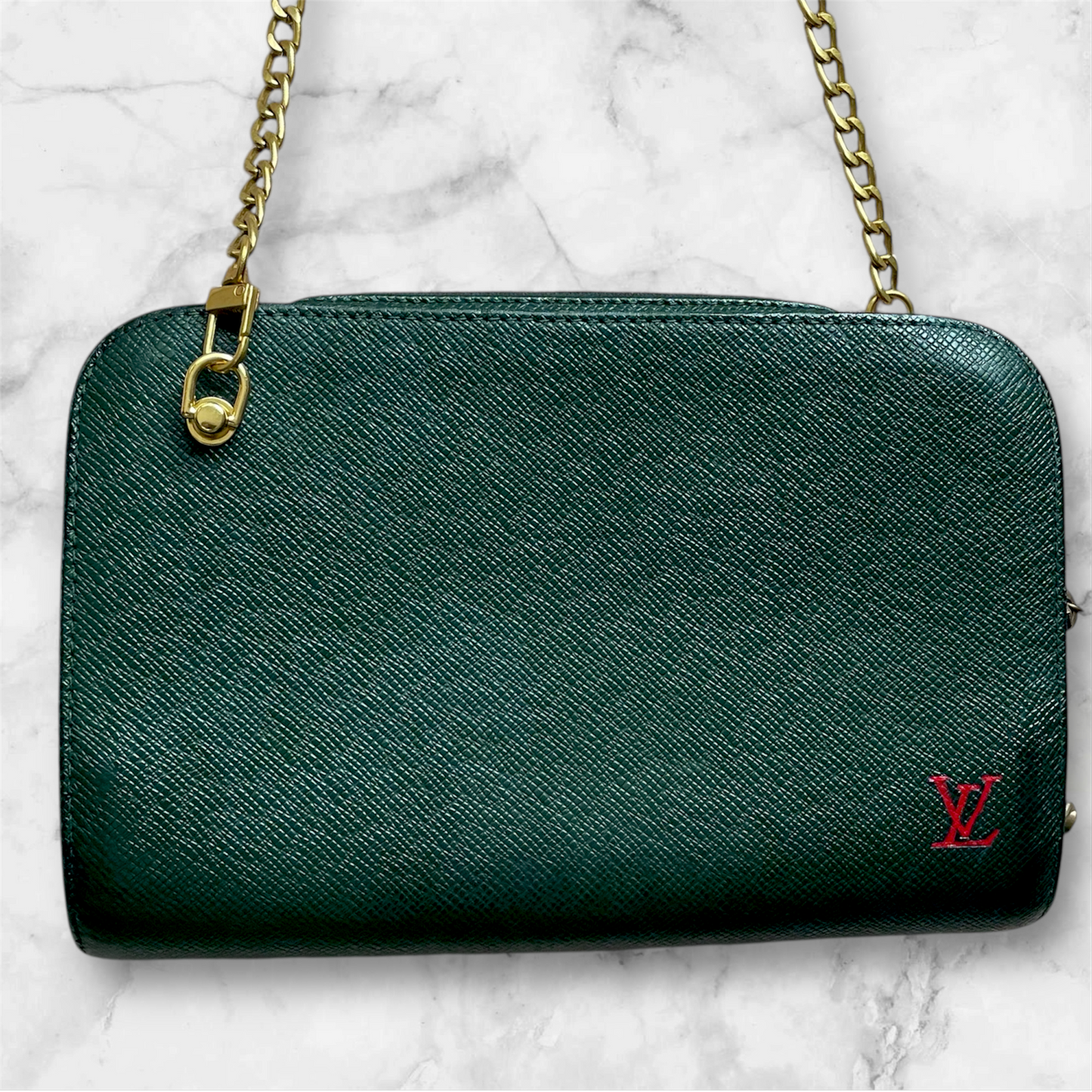 Louis Vuitton Taiga clutch crossbody