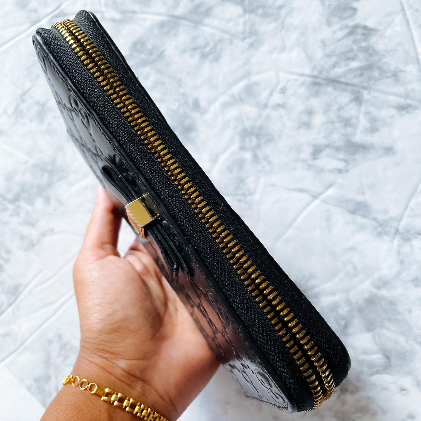 GUCCI Guccissima Bow Zipper wallet