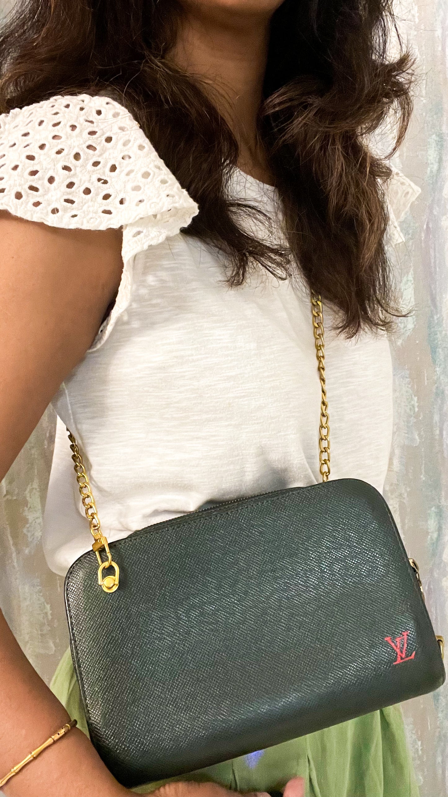 Louis Vuitton Taiga clutch crossbody