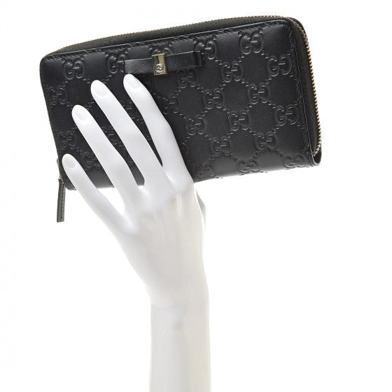 GUCCI Guccissima Bow Zipper wallet