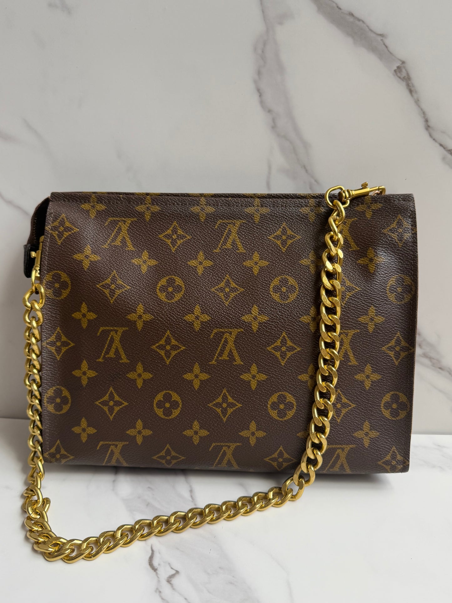 Louis Vuitton Monogram Toilette Clutch as crossbody