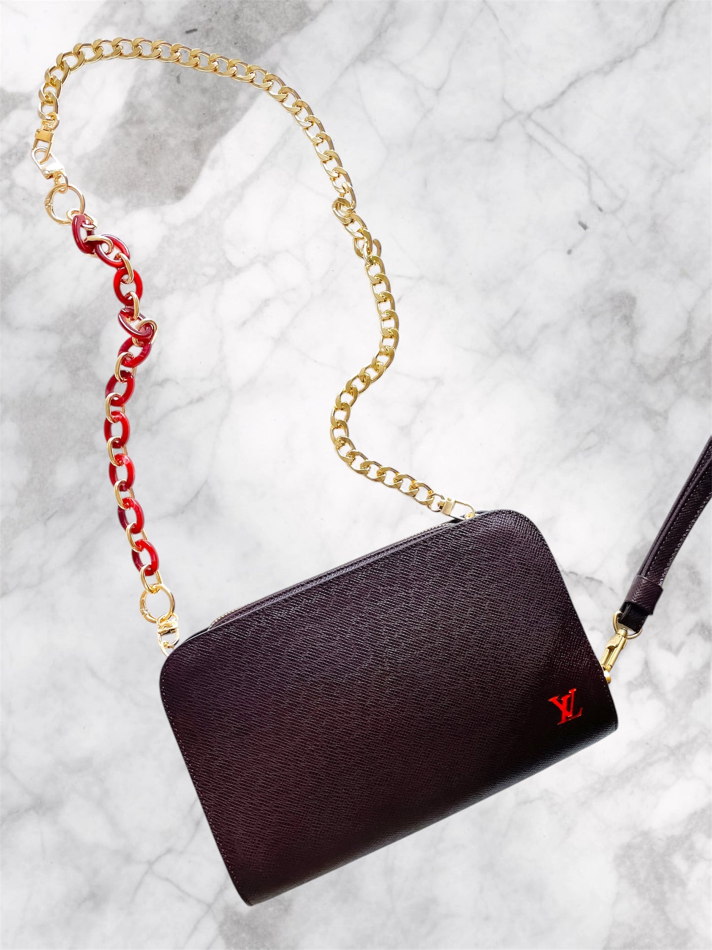 Louis Vuitton Baikal Taiga clutch crossbody