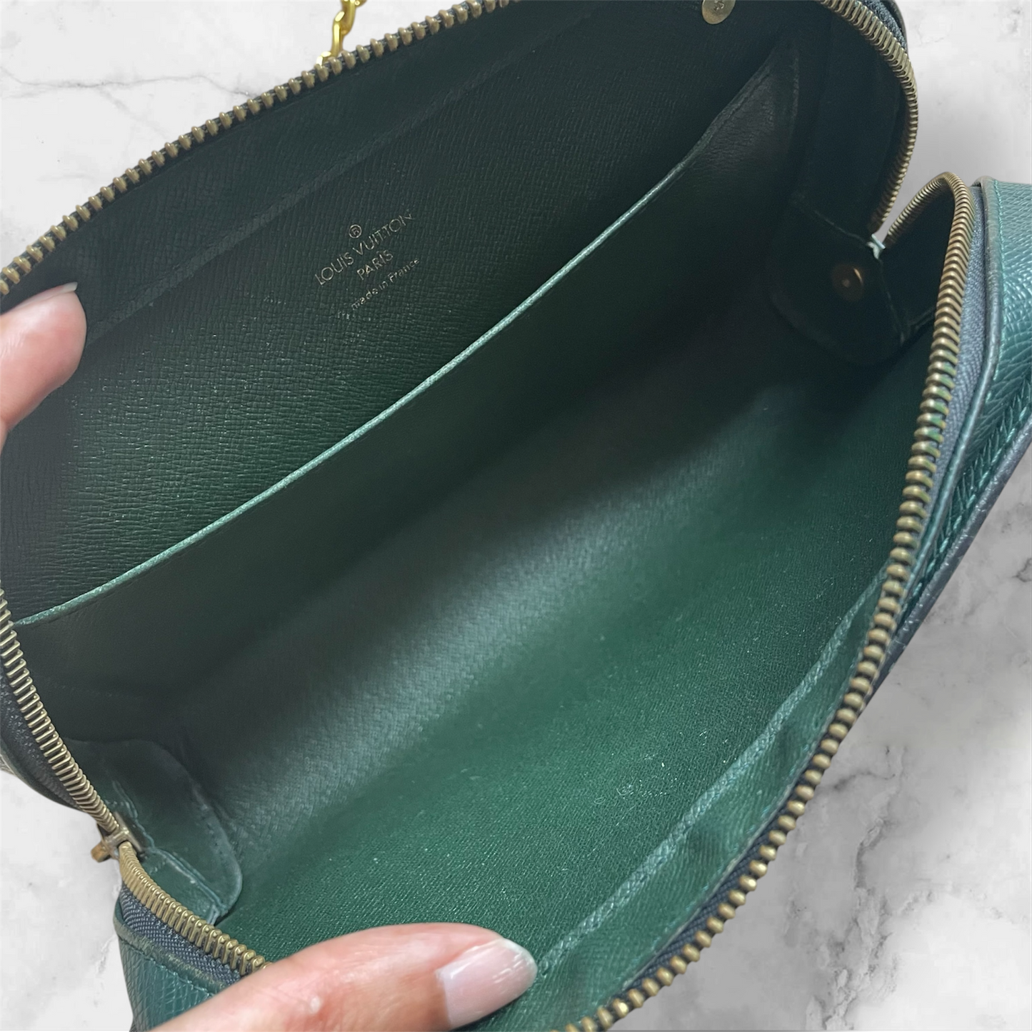 Louis Vuitton Taiga clutch crossbody