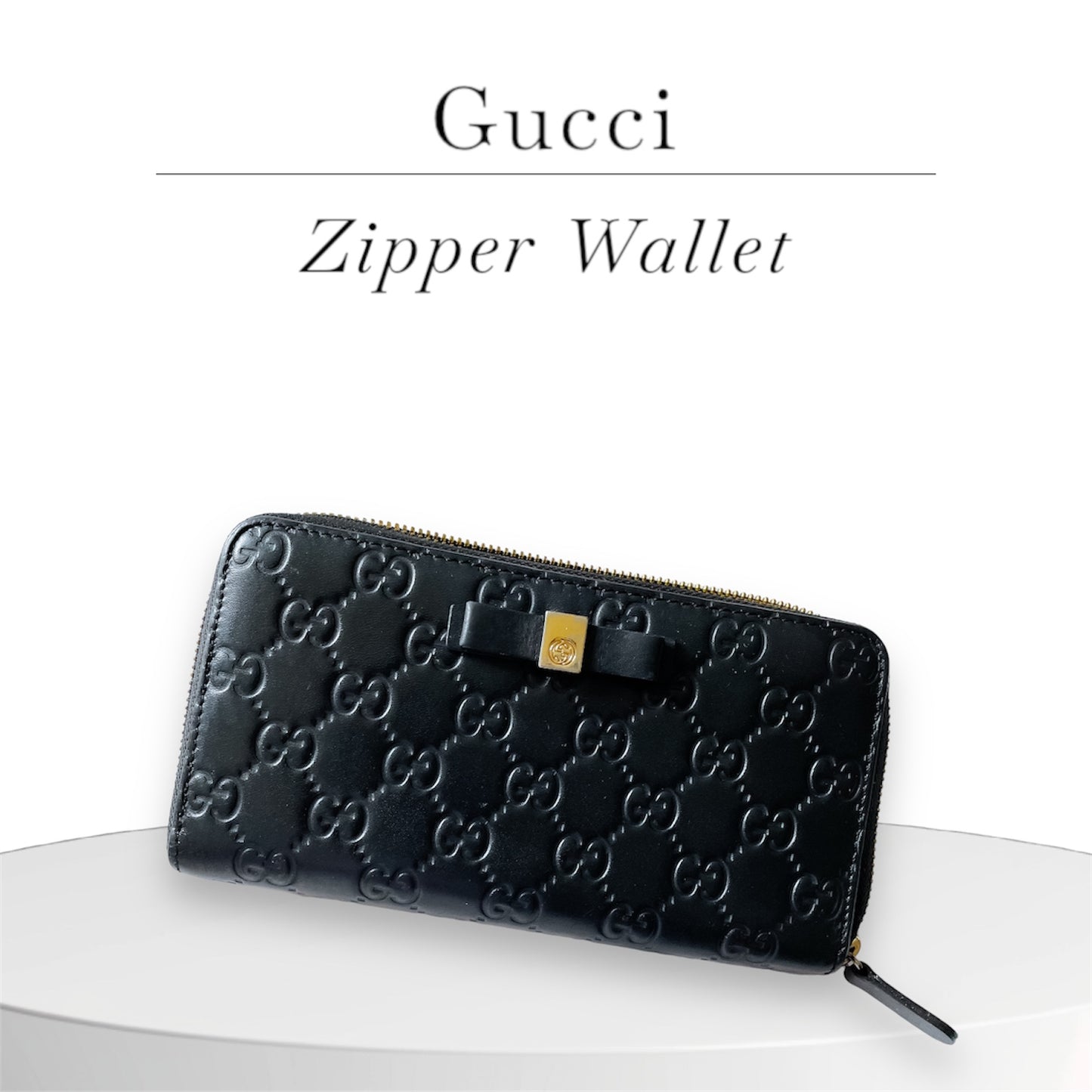 GUCCI Guccissima Bow Zipper wallet