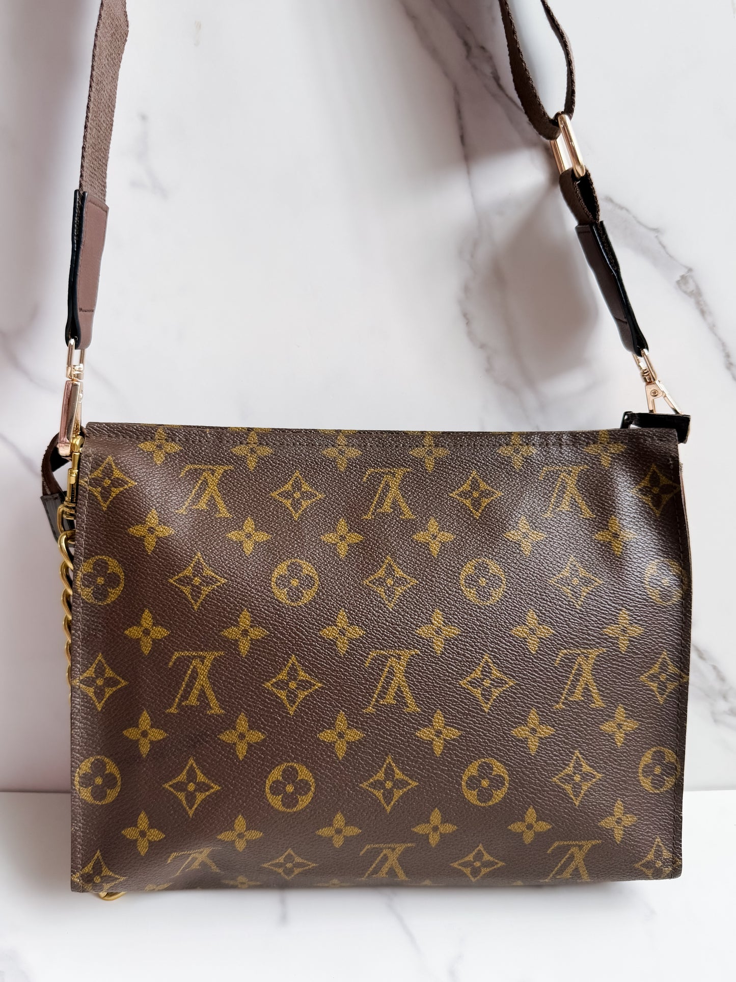 Louis Vuitton Monogram Toilette Clutch as crossbody
