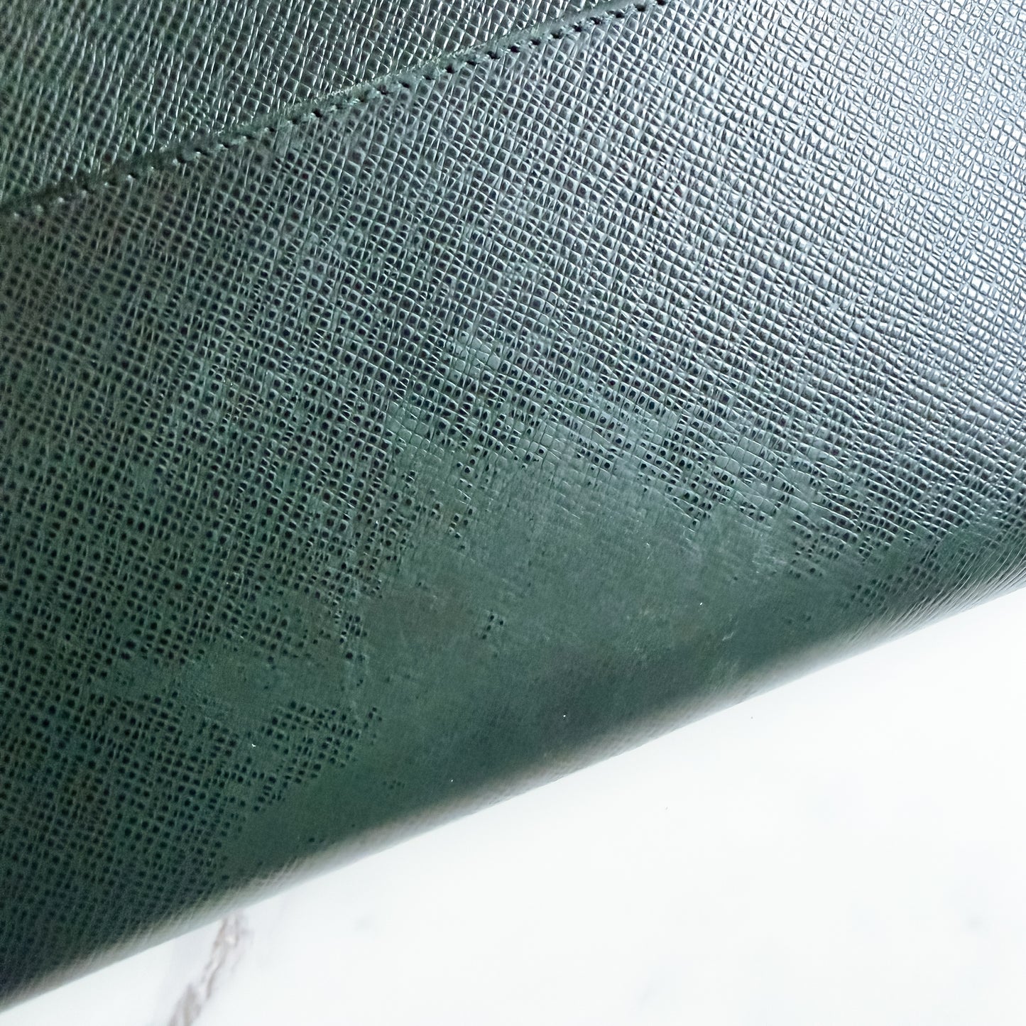 Louis Vuitton Taiga Leather clutch crossbody
