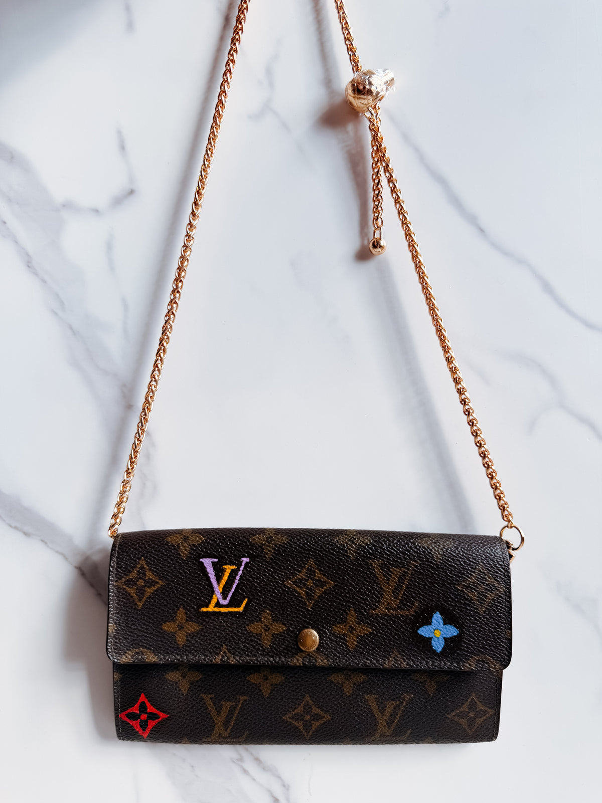 Louis Vuitton custom-painted wallet on chain
