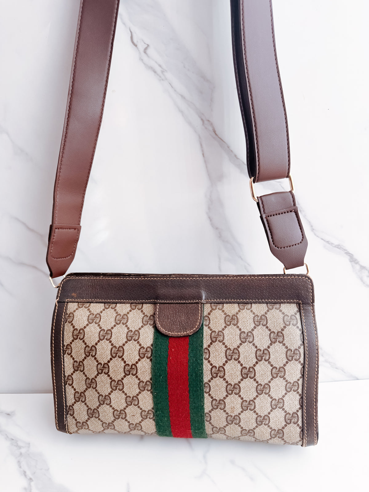 Gucci GG Sherry Line clutch on strap
