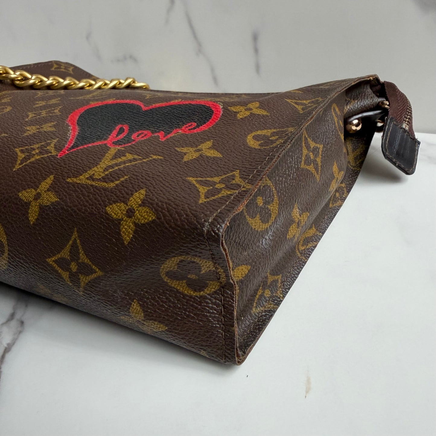 Louis Vuitton Monogram Toilette Clutch as crossbody