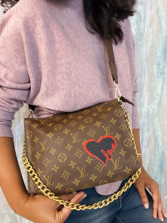 Louis Vuitton Monogram Toilette Clutch as crossbody