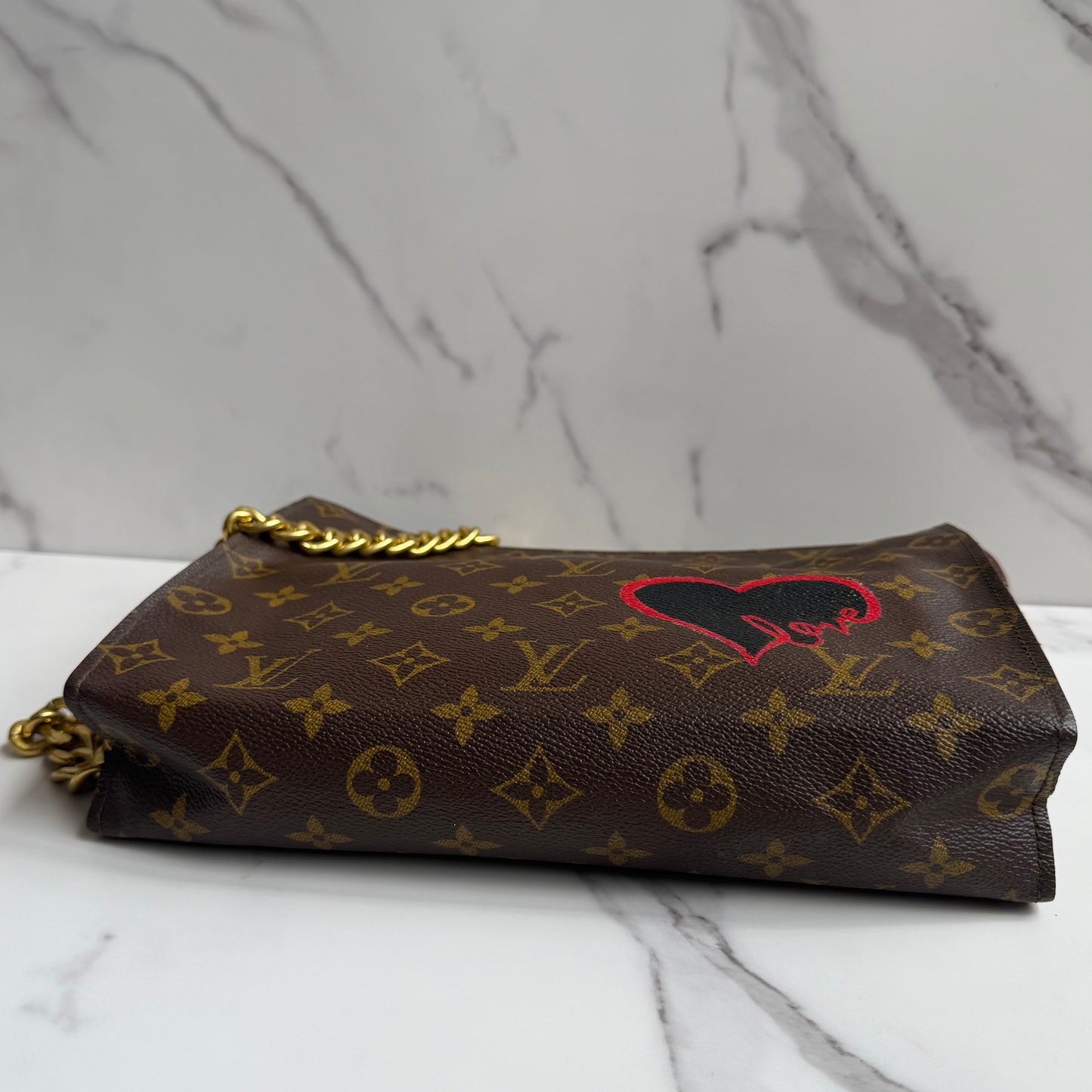 Louis Vuitton Monogram Toilette Clutch as crossbody