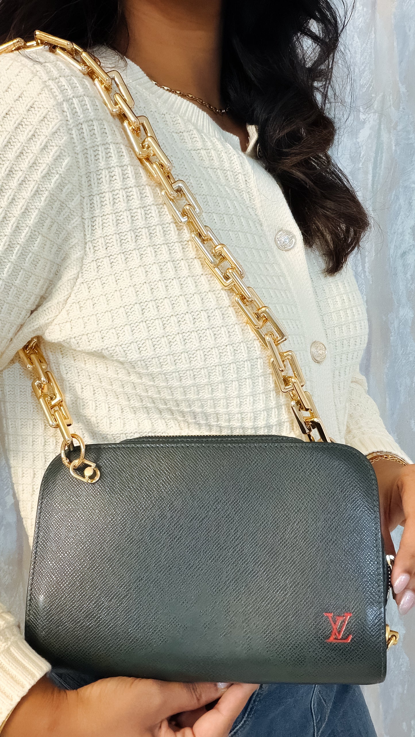Louis Vuitton Taiga Leather clutch crossbody
