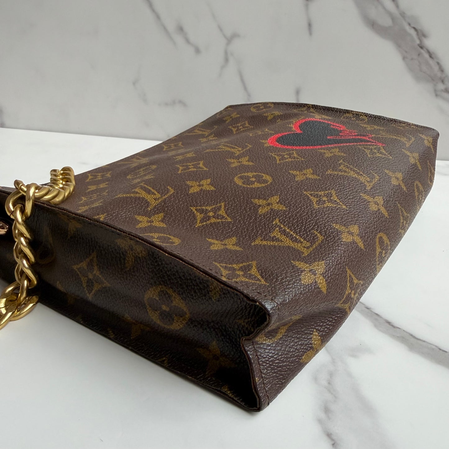 Louis Vuitton Monogram Toilette Clutch as crossbody