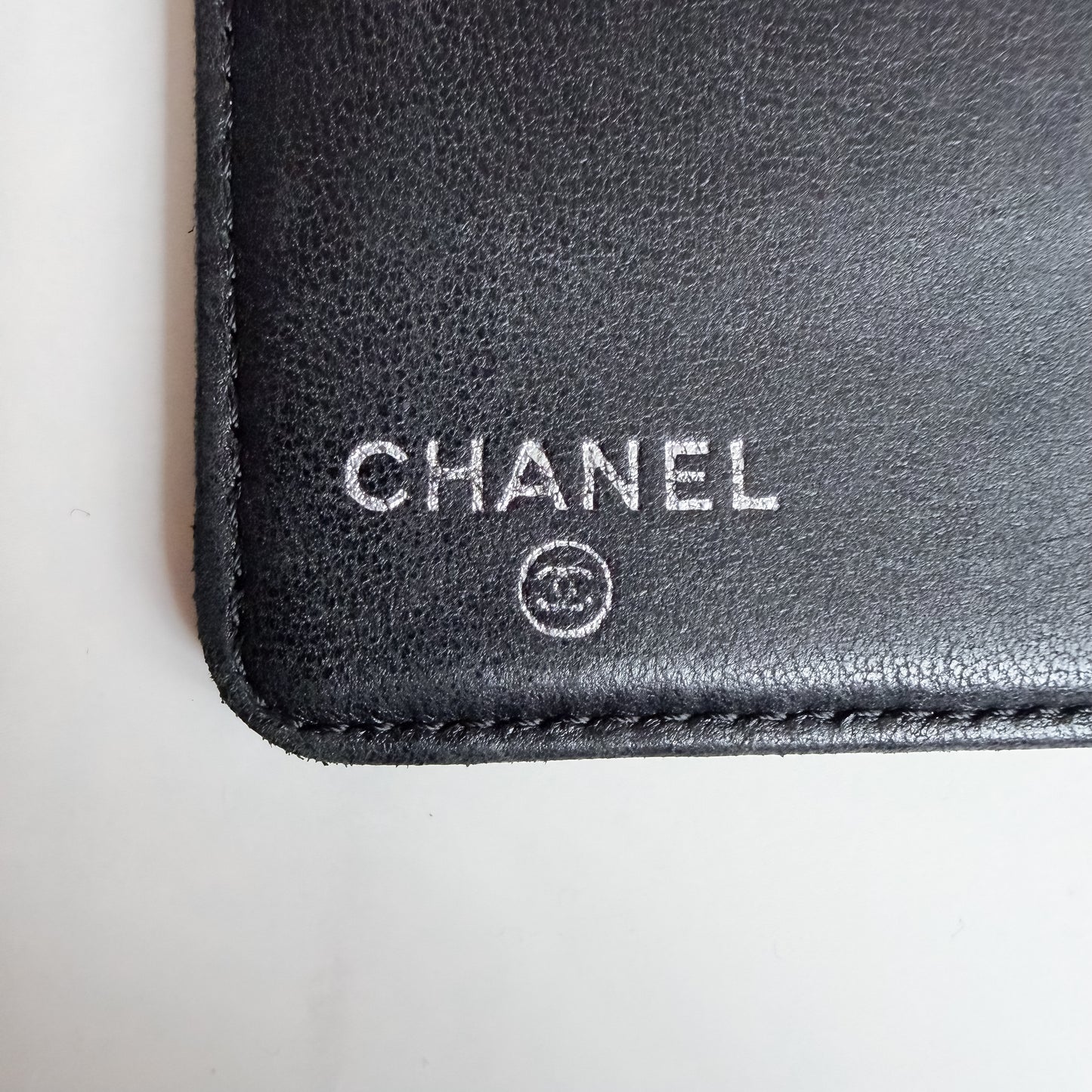 Authentic vintage Chanel Camellia Embossed Leather Wallet on chain