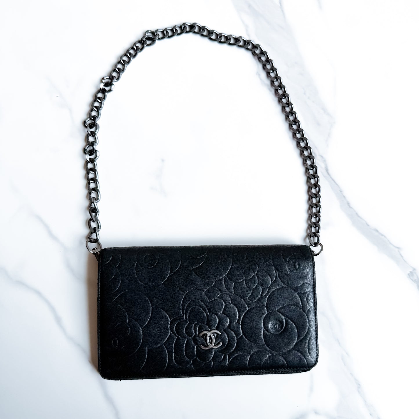 Authentic vintage Chanel Camellia Embossed Leather Wallet on chain