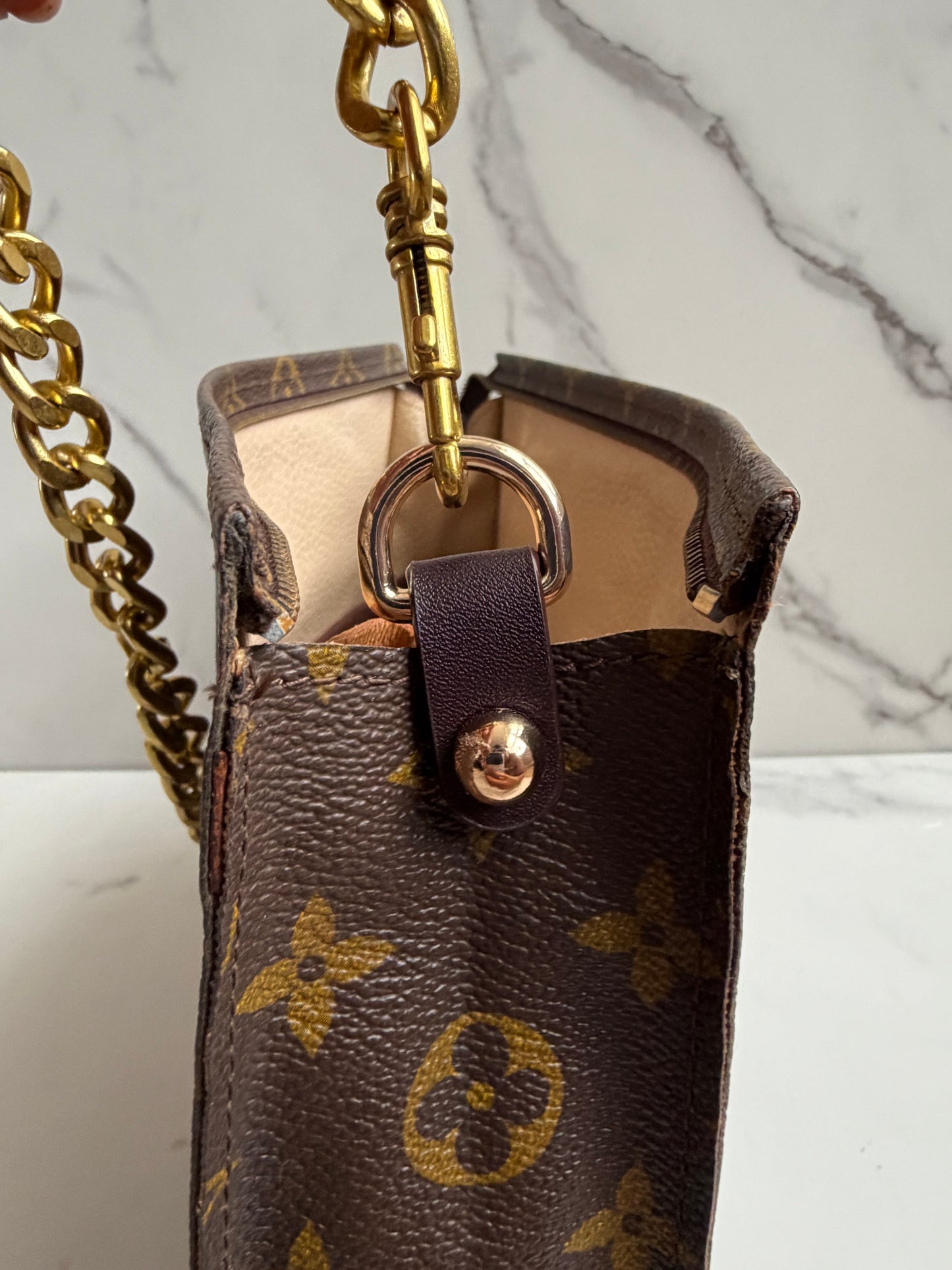 Louis Vuitton Monogram Toilette Clutch as crossbody