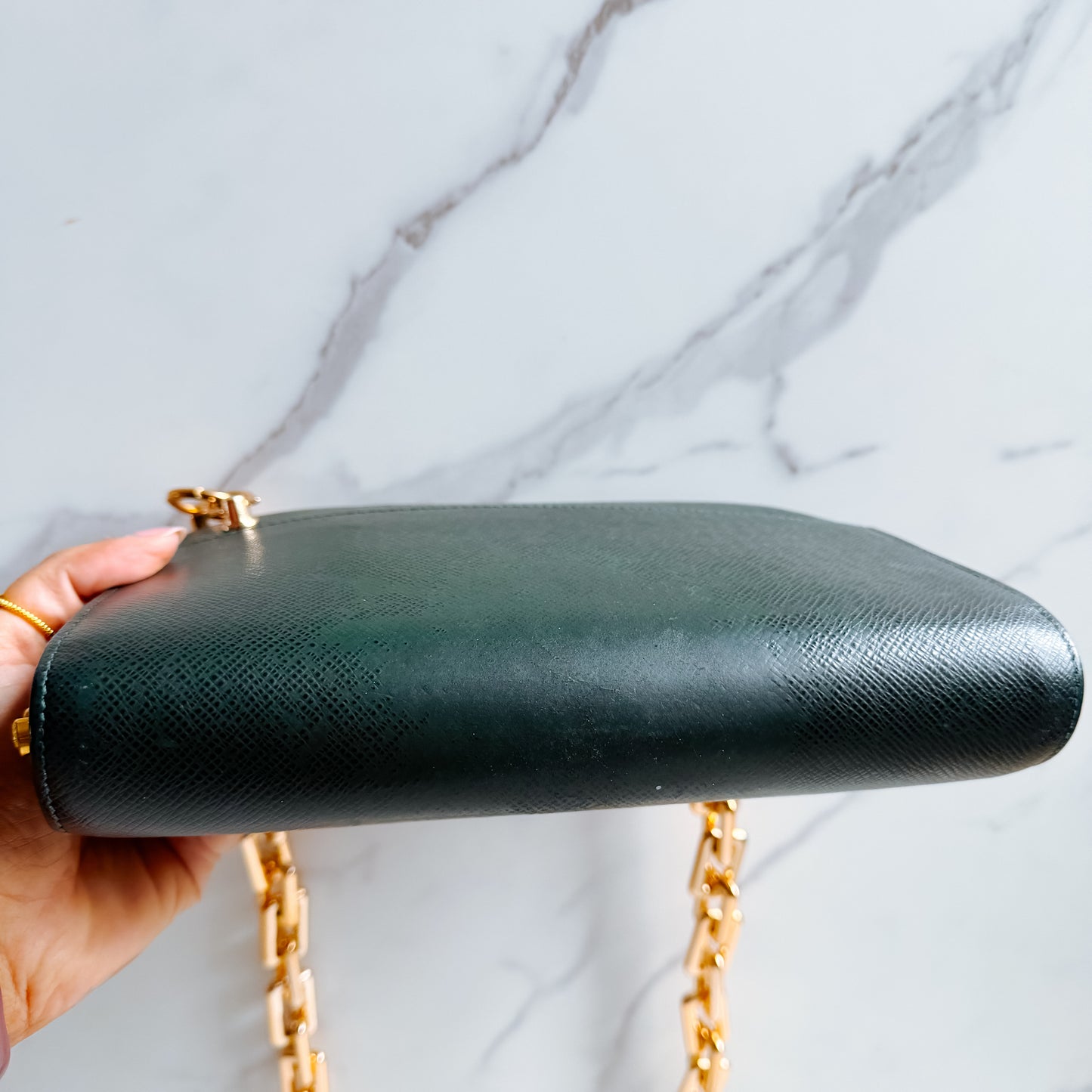 Louis Vuitton Taiga Leather clutch crossbody