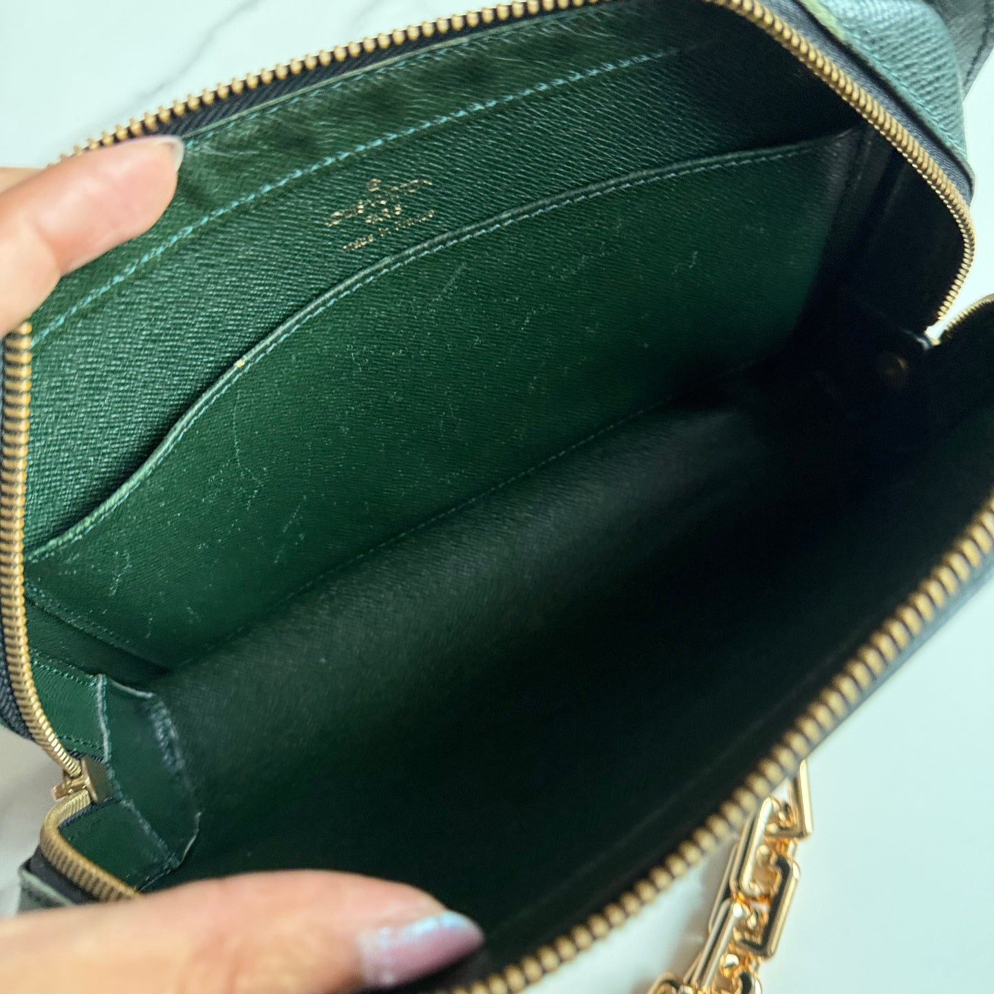 Louis Vuitton Taiga Leather clutch crossbody