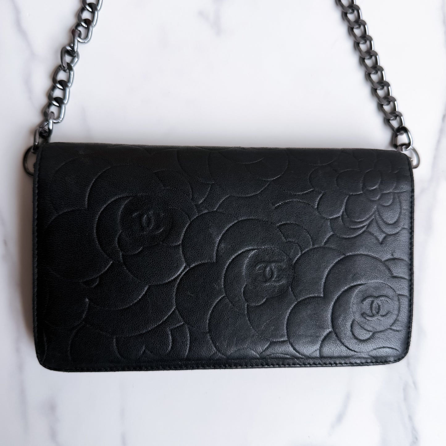 Authentic vintage Chanel Camellia Embossed Leather Wallet on chain
