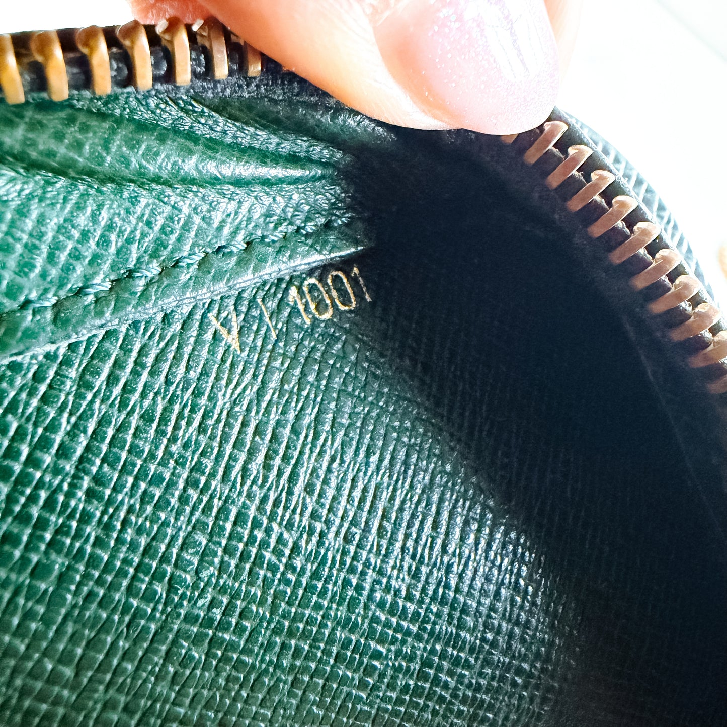 Louis Vuitton Taiga Leather clutch crossbody