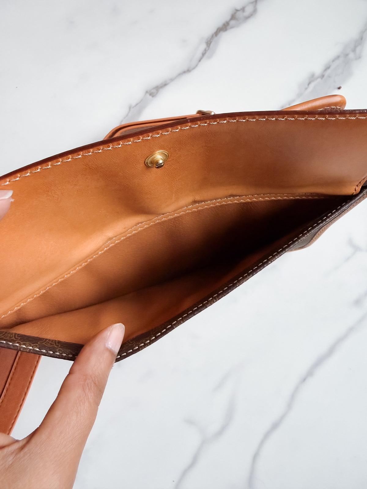 Celine Macadam clutch as crossbody