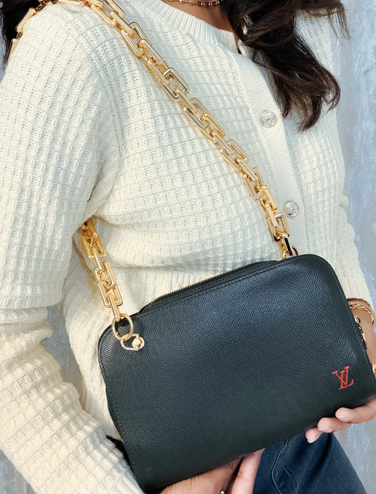 Louis Vuitton Taiga Leather clutch crossbody