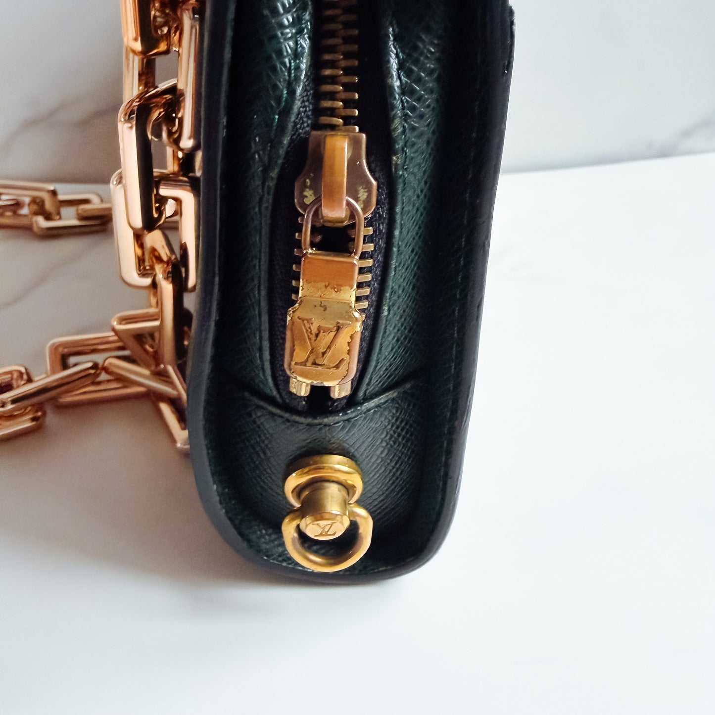 Louis Vuitton Taiga Leather clutch crossbody