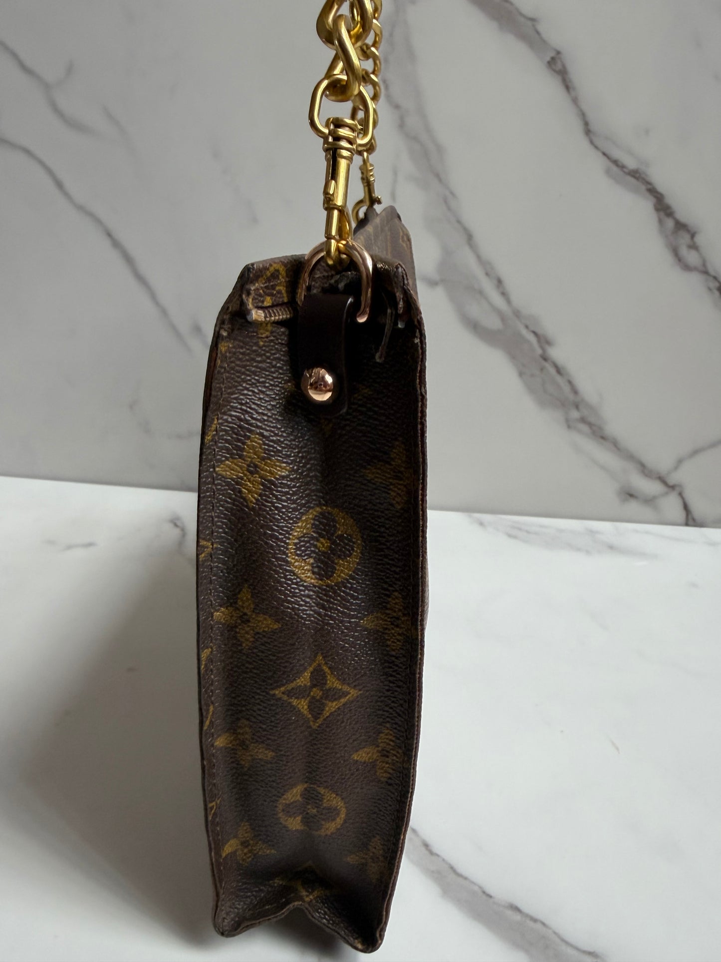 Louis Vuitton Monogram Toilette Clutch as crossbody