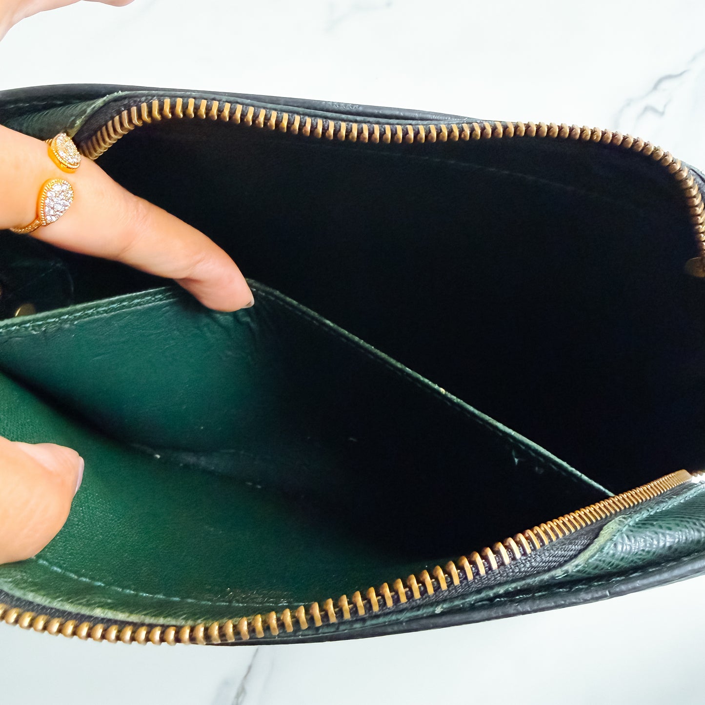 Louis Vuitton Taiga Leather clutch crossbody