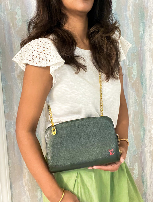 Louis Vuitton Taiga clutch crossbody