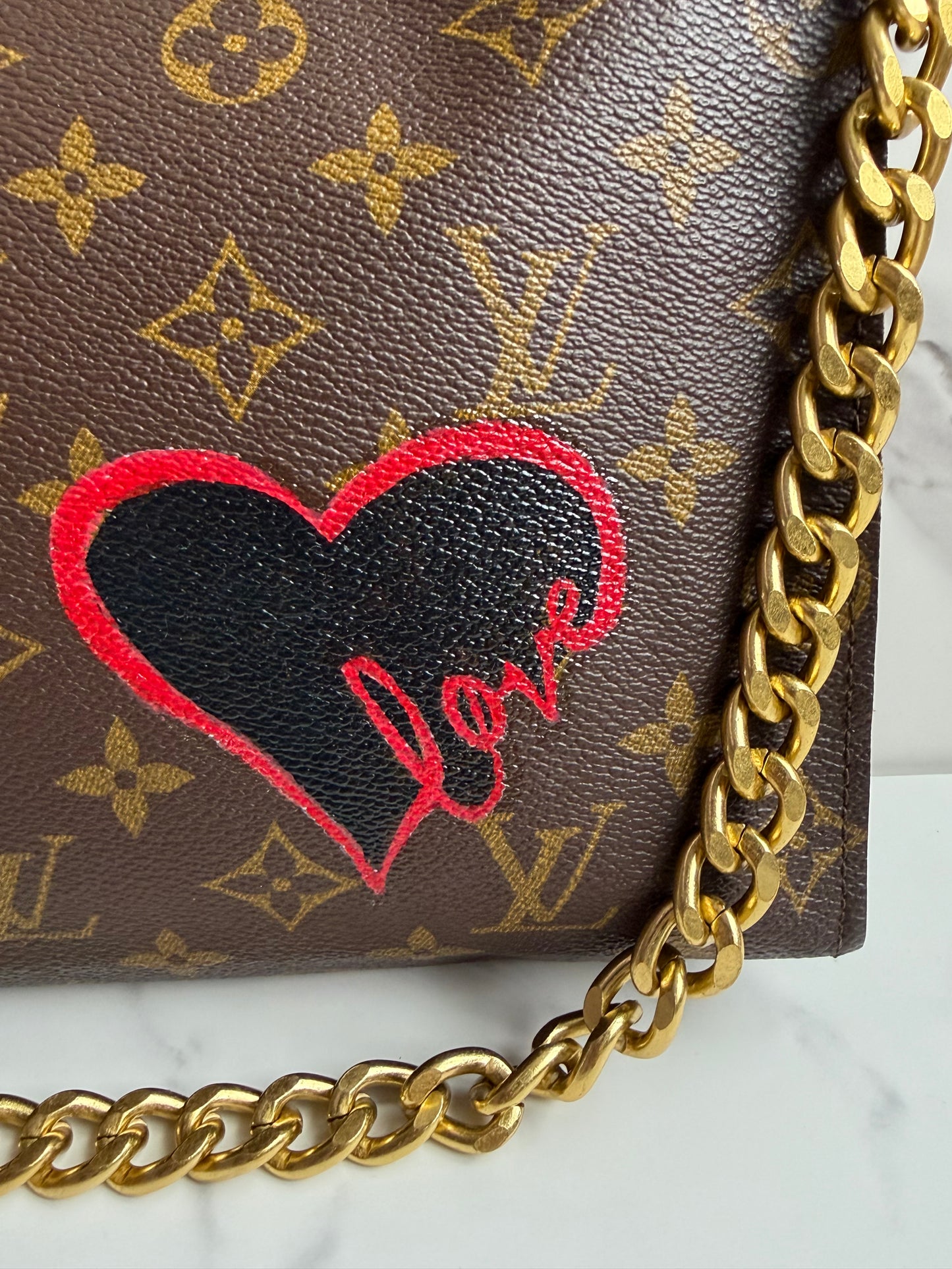 Louis Vuitton Monogram Toilette Clutch as crossbody