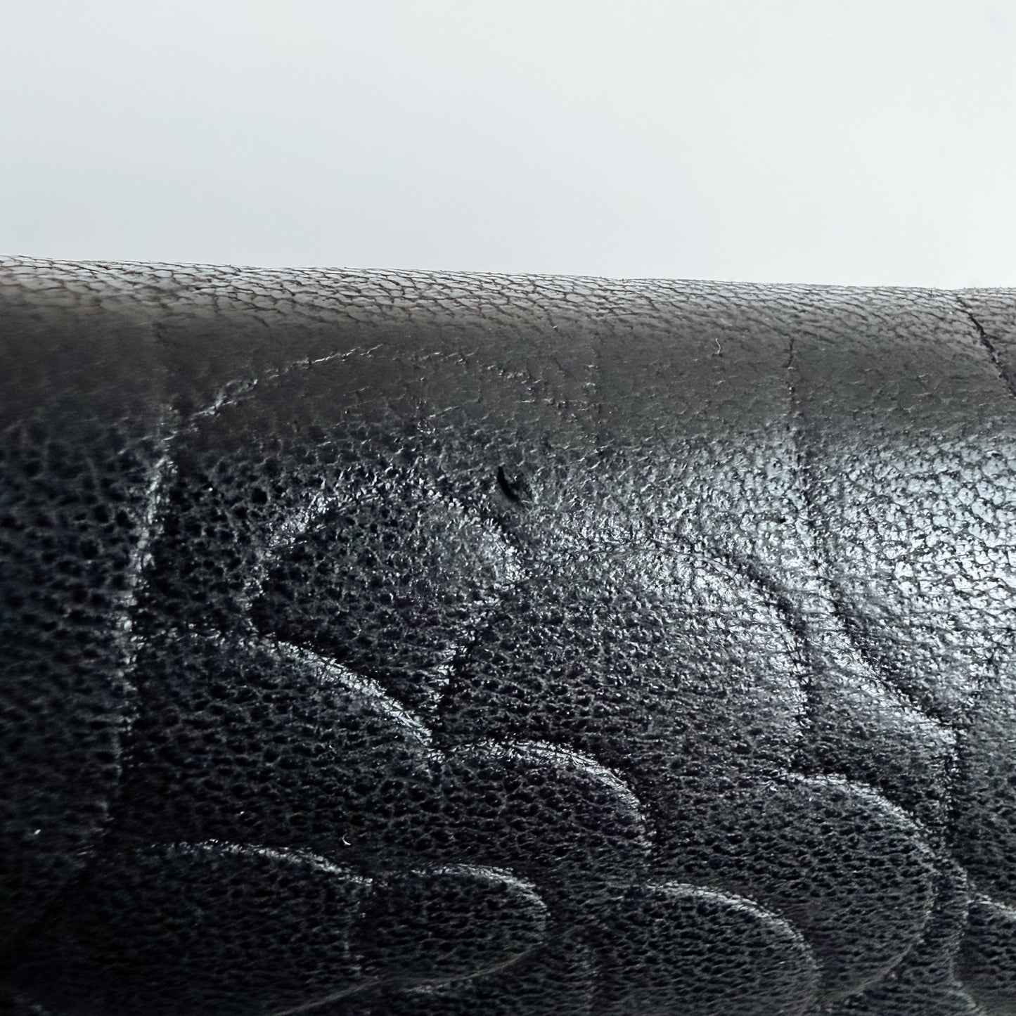 Authentic vintage Chanel Camellia Embossed Leather Wallet on chain