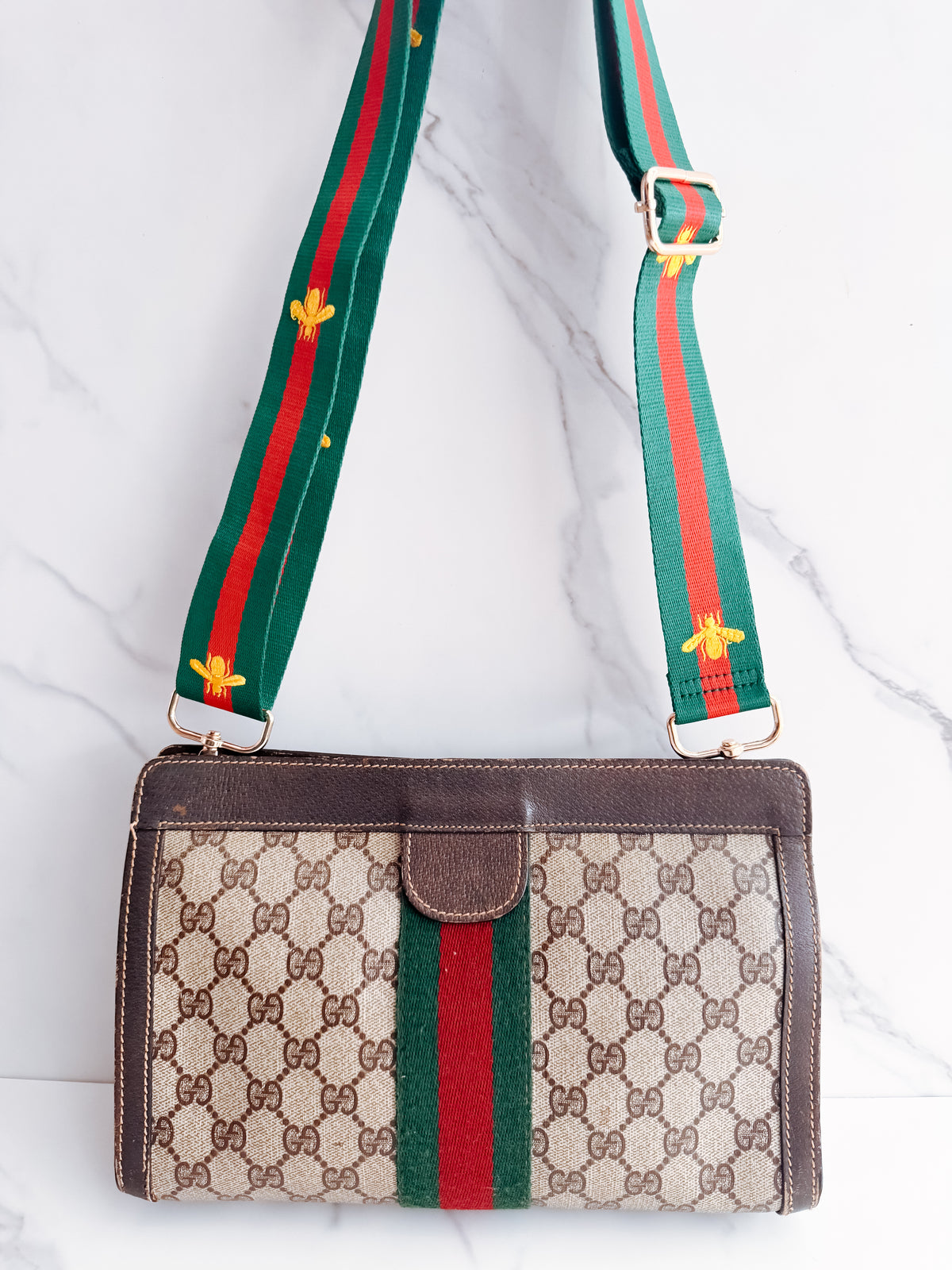 Gucci GG Sherry Line clutch on strap